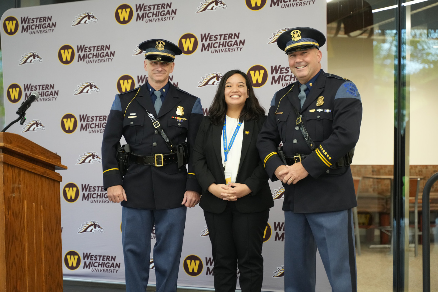 A student receiving her MSP pin.